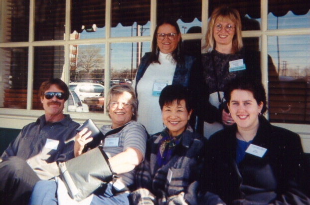 Conference attendees relax during a lunch break
