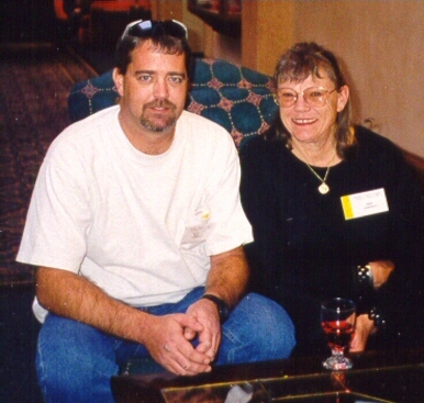 Scott Littleford sits with his birth mother, Sally Lawrence