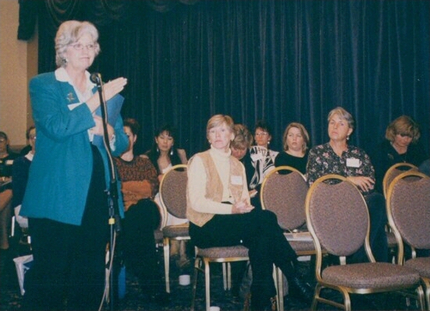 Adoptive mother, Billye Coye, asks a question during legislative panel discussion on Saturday